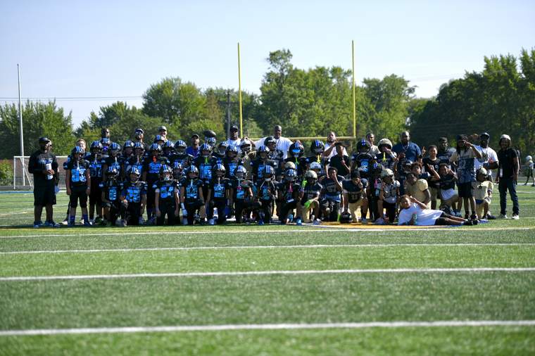 612 Promise players and coaches gathered on the field after practice
